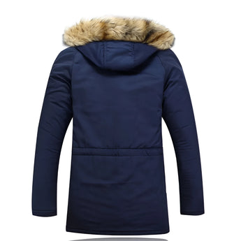 Women's navy blue faux fur hooded insulated water-resistant parka with a fitted waist, long sleeves, and a cozy faux fur-lined collar.