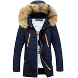 Women's navy blue faux fur hooded insulated water-resistant parka in marine blue, size XL with a plush fur-lined hood and full-length sleeves.