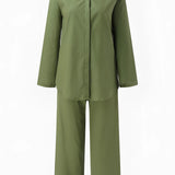 Women's navy blue linen shirt and pants set, casual summer outfit featuring long sleeves, button-down design, and a structured collar.
