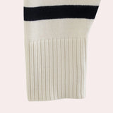 Women's navy blue striped sweater with long sleeves, featuring a casual fall fashion pullover design made from woolen woven fabric.