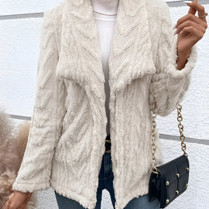 Women's off-white textured fleece jacket featuring a faux fur collar, showcased with a focus on outerwear style, shoulder design, and sleeve detail.