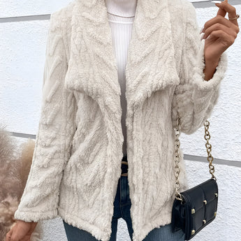 Women's off-white textured fleece jacket featuring a faux fur collar, showcased with a focus on outerwear style, shoulder design, and sleeve detail.