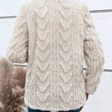 Women's off-white textured fleece jacket with faux fur collar, featuring a stylish design with long sleeves and a warm, cozy feel.