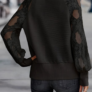 Women's olive green sweater featuring delicate lace sleeves, showcasing a trendy knitwear design with a focus on outerwear fashion.