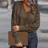 
Woman wearing a trendy olive green sweater with lace sleeves, showcasing a stylish knitwear design.