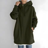 
A light green oversized zip-up hoodie for women, featuring a relaxed fit with soft fabric, showcasing details like a full-length zipper, long sleeves, and a comfortable collar.