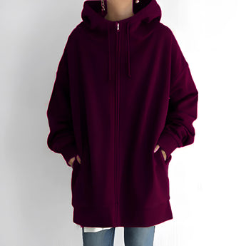 Women's oversized dark purple zip-up hoodie with a relaxed fit, featuring soft fabric and long sleeves.