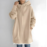 Women's oversized gray zip-up hoodie with a relaxed fit, featuring a soft fabric and a focus on details like the shoulder, neck, sleeve, and collar design. The hoodie is displayed in a khaki color, size 5XL.