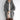 Women's oversized gray zip-up hoodie featuring a soft fabric, relaxed fit, visible arm and sleeve details, and comfortable waist and neck design.