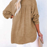 Women's oversized linen V-neck blouse, lightweight and breathable, button-up, white with long sleeves.