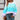 Women's oversized pastel striped knit sweater in cozy aqua and purple tones, featuring a relaxed fit with a crew neckline and long sleeves, ideal for a casual and fashionable look.