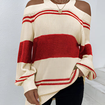 
A woman wearing an oversized red stripe off-shoulder sweater, styled for autumn fashion, showcasing the arm and shoulder areas with white and red stripes. The sweater features a jersey-knit texture with long sleeves and a loose fit, suitable for casual wear. The variant style is XL.