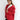 
A woman wearing an oversized red teddy coat with long sleeves and a plush texture, suitable for winter. The coat is designed with a wide collar and falls to the waist, creating a stylish and cozy look. The model showcases the coat in a fashion setting.