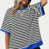 Women's oversized striped tee in blue, featuring a casual loose fit with white stripes. The T-shirt has short sleeves and a round neckline, ideal for a relaxed and fashionable look. Suitable for size 2XL, it offers comfortable wear and a stylish appearance.