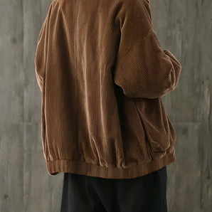 Women's oversized vintage-style corduroy blazer in brown, featuring a classic collar, long sleeves, and waist-length design.