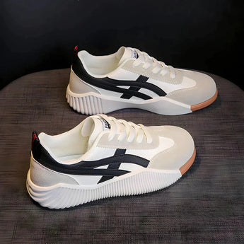 Women's pastel chunky sneakers in a stylish multi-color design, featuring a predominantly grey color scheme with black accents. The sneakers are designed for urban environments and are available in size 41.