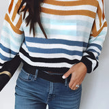 Women's lightweight sweater with pastel stripes, featuring a crew neck design. The sweater is knit, showcasing a fashion-forward style, and is ideal for layering as outerwear.