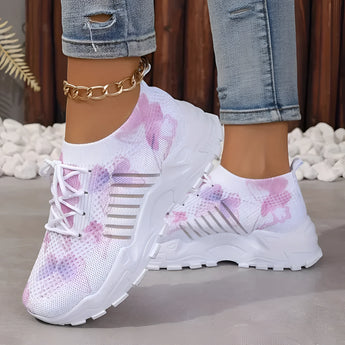 Women's pink floral mesh running shoes showcasing a lightweight and breathable design, featuring pink and white accents.