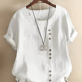 
White oversized short sleeve casual blouse for women with a round neck and subtle collar detailing.