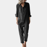 
An oversized long sleeve linen shirt for women, featuring a casual and breathable design in a black color, suitable for an XL size, displayed with emphasis on the collar and sleeve details.