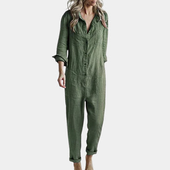 A woman wearing a green oversized long sleeve linen shirt, showcasing the breathable and casual design with a visible collar and relaxed fit suitable for an XL size.