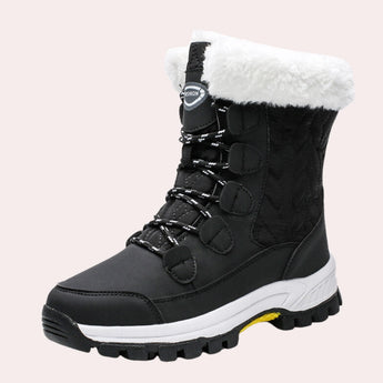 Women's black waterproof winter boots with a quilted design and fur lining, size 42.