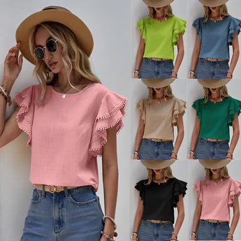 Women's pink ruffle sleeve blouse with tassels, featuring a chic summer design.