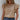Women's pink ruffle sleeve blouse featuring chic tassels, styled in the khaki color variant in size 2XL, displayed on a mannequin with emphasis on the detailed ruffle sleeves and the relaxed fit.