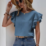 
A women's pink ruffle sleeve blouse with tassels, featuring chic summer fashion design elements. The blouse is styled with ruffled sleeves that add a feminine touch, complemented by a tassel detail for a trendy look.