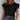 Women's black ruffle sleeve blouse in size 2XL featuring chic summer style with detailed ruffles on the shoulders and tassels, designed for a stylish and fashionable look.