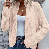 Women's pink teddy coat, fluffy plush jacket designed for cozy winter wear, featuring long sleeves, fashionable styling, and a soft texture.