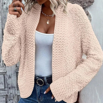 Women's pink teddy coat, fluffy plush jacket designed for cozy winter wear, featuring long sleeves, fashionable styling, and a soft texture.