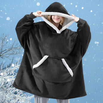 Women's black plush oversized fleece hooded winter robe with long sleeves, designed for warmth and comfort as loungewear.
