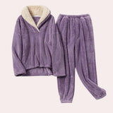 Women's purple fleece pajama set with plush hoodie, featuring long sleeves and designed in a cozy woolen fabric, size 2XL.