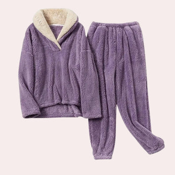 Women's purple fleece pajama set with plush hoodie, featuring long sleeves and designed in a cozy woolen fabric, size 2XL.