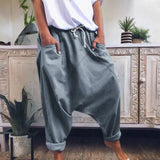 Women's gray bohemian harem pants in size XL featuring an elastic ankle and drawstring waist, with a casual and comfortable fit.