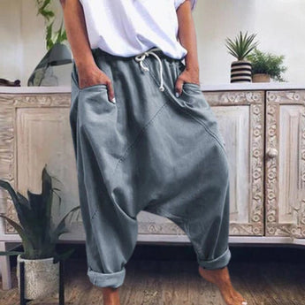 Women's gray bohemian harem pants in size XL featuring an elastic ankle and drawstring waist, with a casual and comfortable fit.