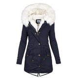 Women's blue insulated parka with faux fur hood, featuring a stylish design with long sleeves and button details, ideal for winter fashion.