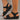 
A pair of women's red leather buckle sandals in size 43, featuring a stylish and comfortable design ideal for summer. The image shows the sandals being worn, highlighting their fashionable appeal and quality material.