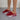 Women's red mesh slip-on sneakers with a breathable design and air-cushioned sole, shown in variant size 43.