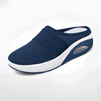 Women's red mesh slip-on sneakers with breathable design and air-cushioned sole, displayed in electric blue color variant labeled "Azzurro," suitable for walking and outdoor activities.