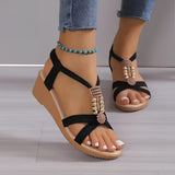 Women's Rhinestone Wedge Sandals in Chic Black, featuring a summer fashion design with high heels and rhinestone embellishments, shown on a model's feet and legs.
