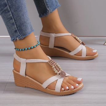 Women's Rhinestone Wedge Sandals in Chic Black, showcased with a fashionable summer dress.