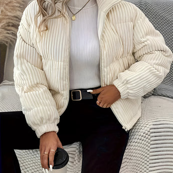 White women's ribbed high collar insulated puffer jacket featuring long sleeves and a fitted waist.