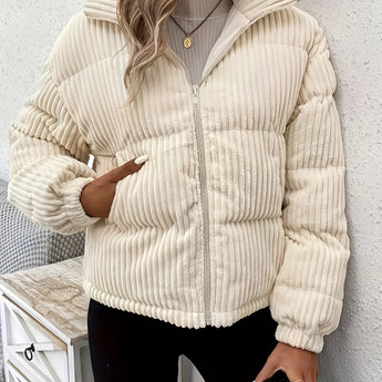 
A women's white insulated puffer jacket featuring a ribbed high collar.