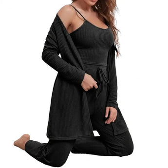 Women's black ribbed knit cold shoulder jumpsuit in XL, showcasing cozy fall loungewear with long sleeves and fitted legs.