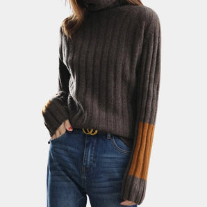 Women's brown and mustard color block ribbed knit turtleneck sweater, shown in coffee color, size XL, worn with jeans.
