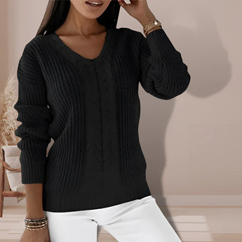 
A black Women's V-neck cable knit chunky sweater in size 2XL, featuring a textured design with long sleeves and a relaxed fit.