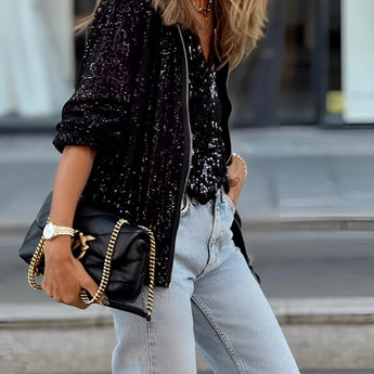 Women's sequin blazer with a glittery finish, featuring long sleeves, a tailored fit, and a single-button closure; ideal for street style evening wear.