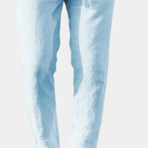 Women's skinny pastel blue jeans in a casual denim style, showcasing a slim fit around the waist and legs.